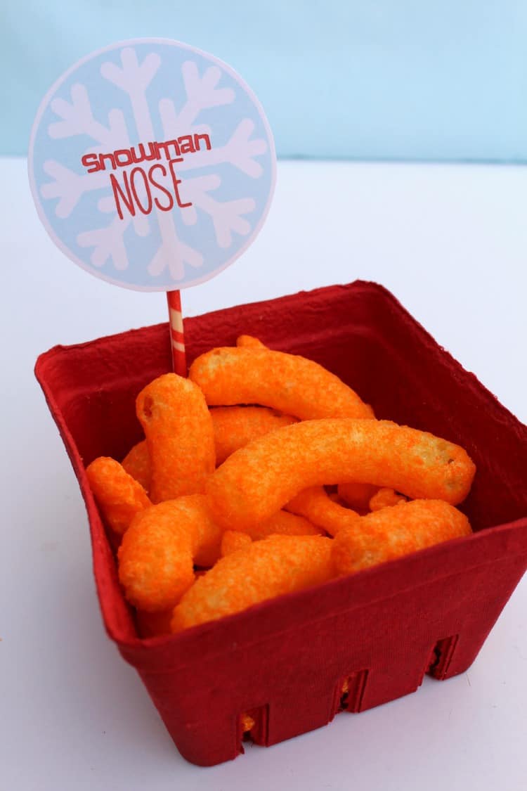 snowman nose with cheetos