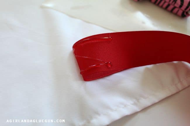 hot glue ribbon on dust ruffle