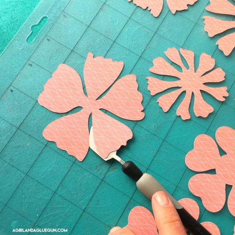 How to make paper flowers A girl and a glue gun