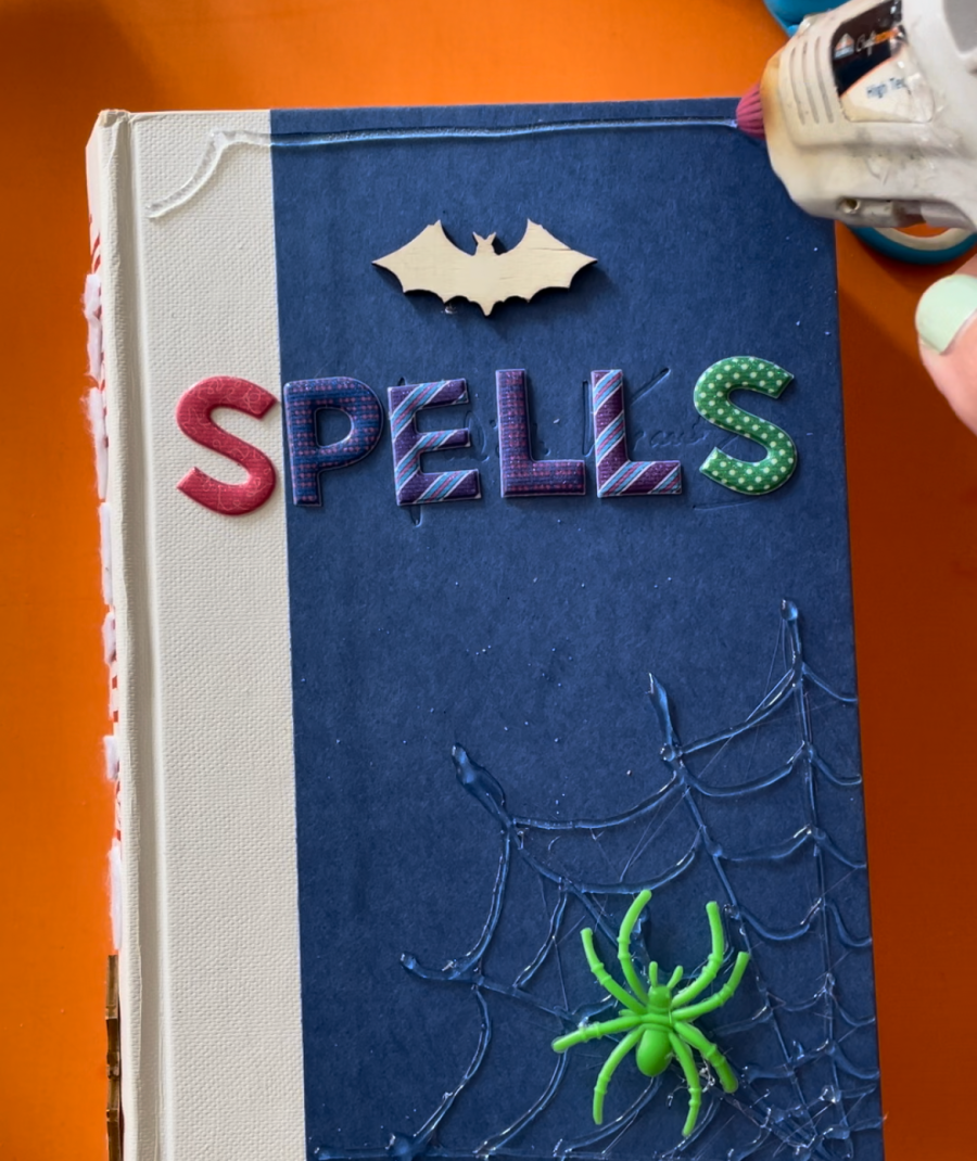 hot glue gun embellishments on spell books