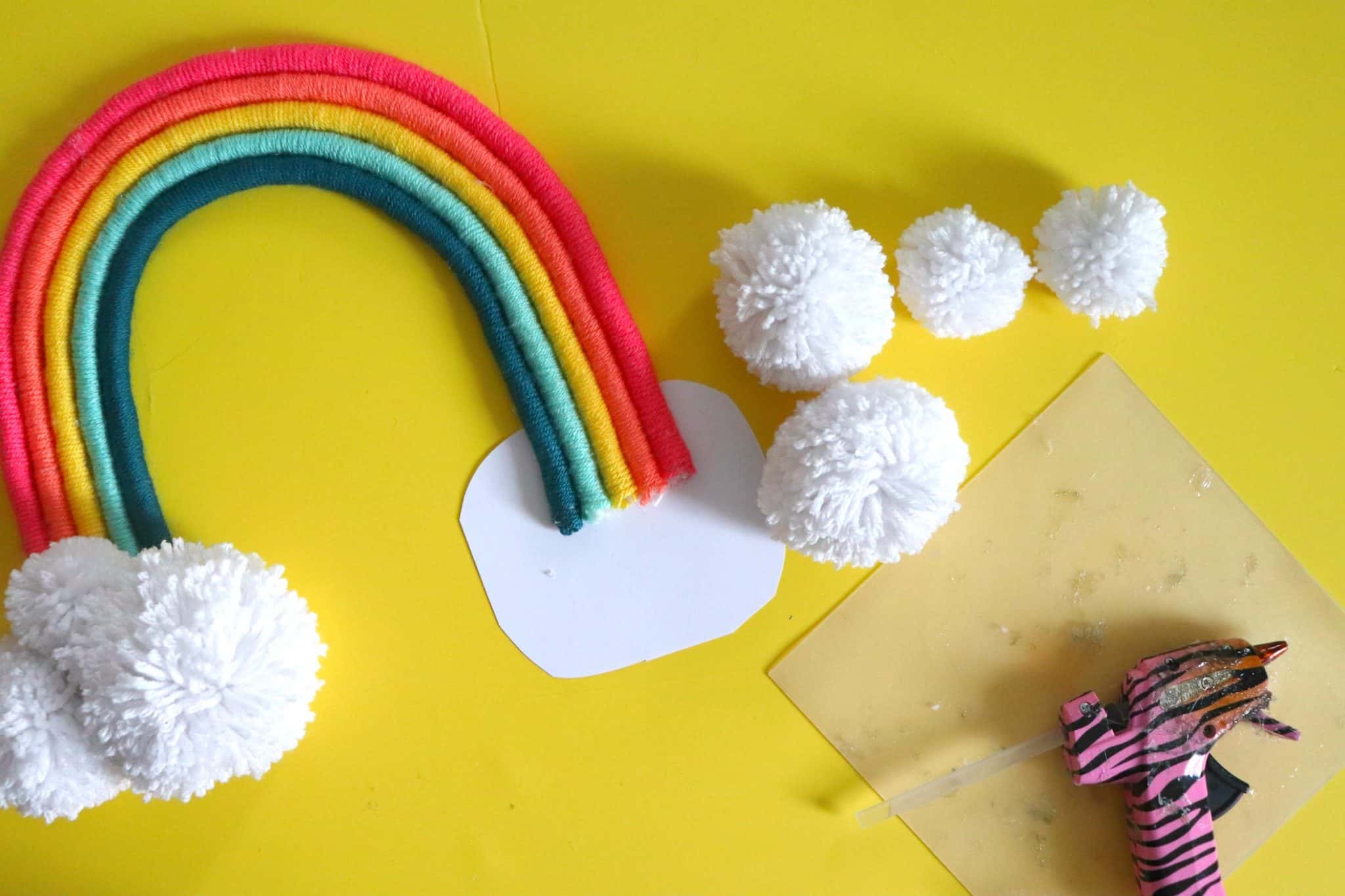 Yarn wrapped rainbow - A girl and a glue gun
