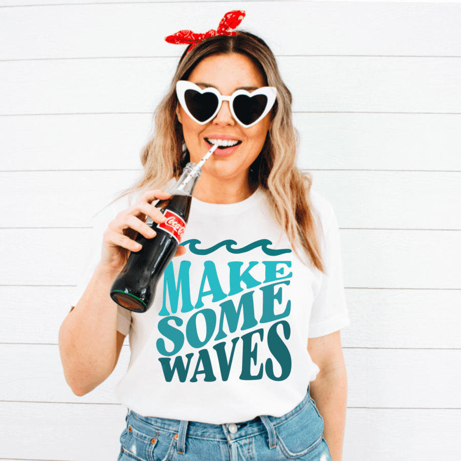 lady wearing a shirt that says make some waves