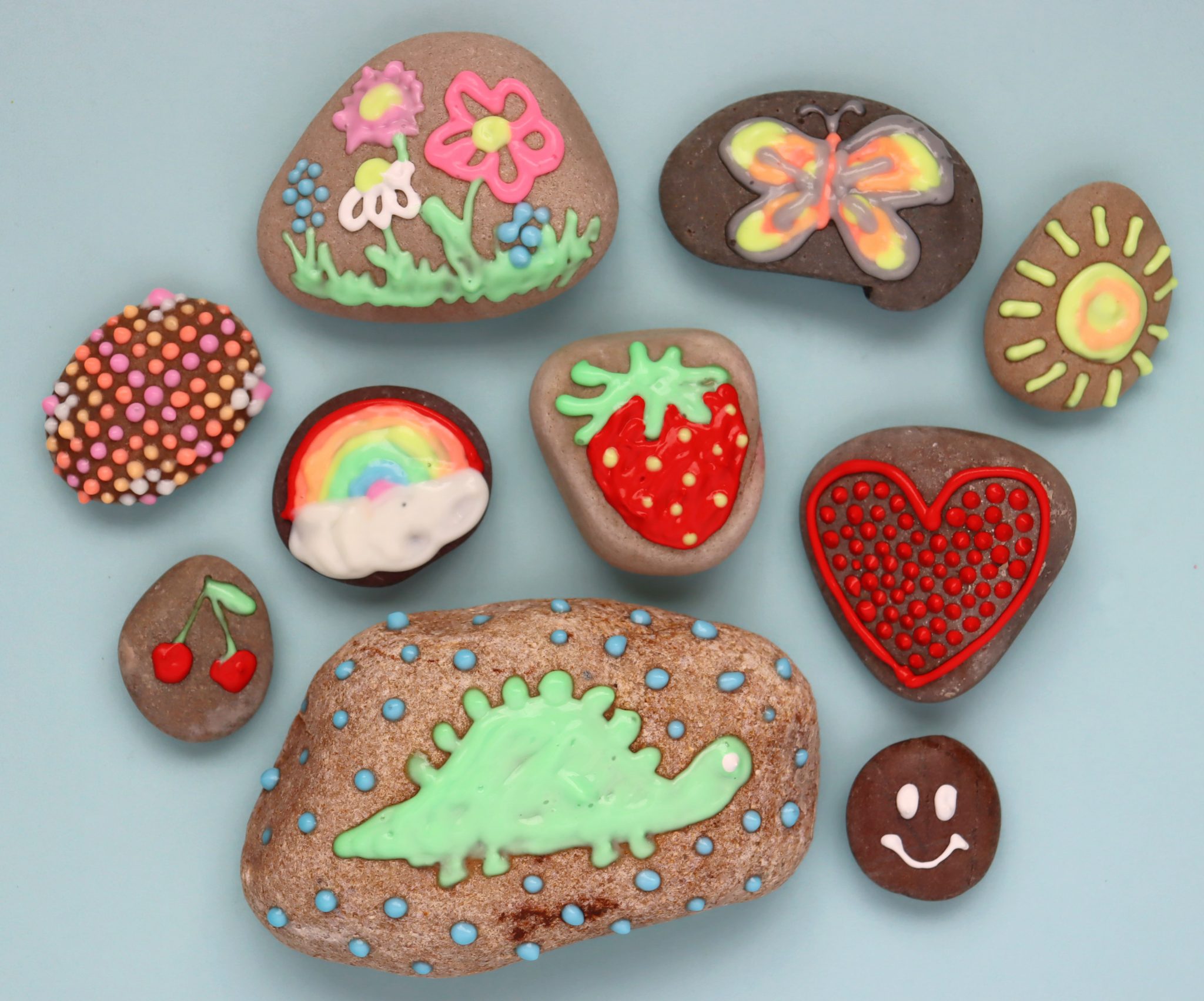 Painted Rocks Doolies Puffy Painted rocks - A girl and a glue gun